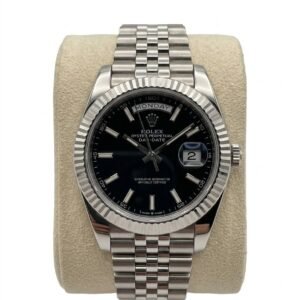 ROLEX DAYJUST IN OYSERSTEEL WITH A BLACK DIAL